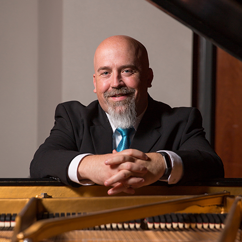 Mark Laughlin at piano