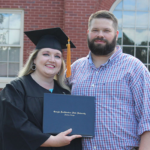 PJ Wilson and husband Jesse after her graduation