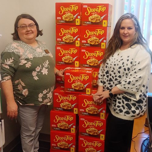 nursing faculty with stuffing donations