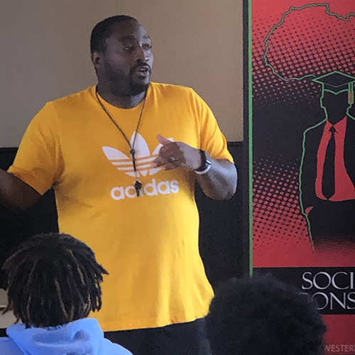 Marcus Faison speaks to students