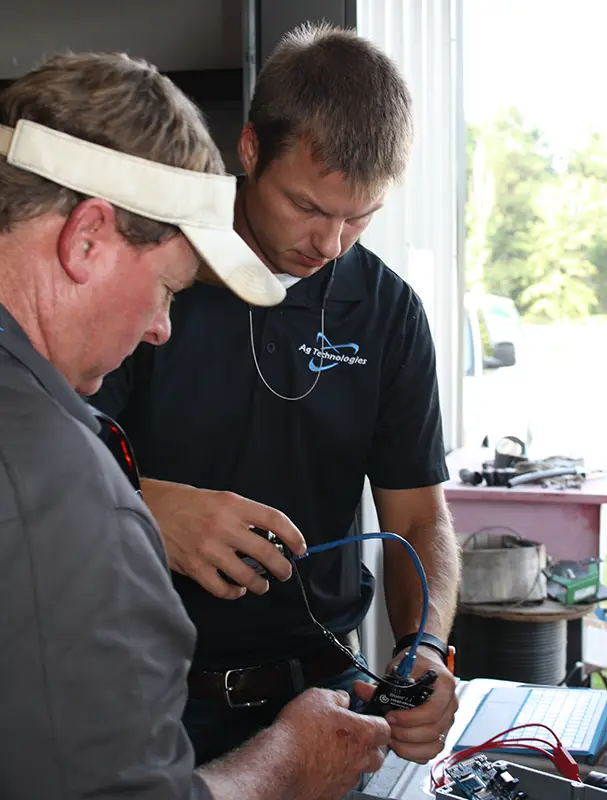 Travis works on irrigation equipment