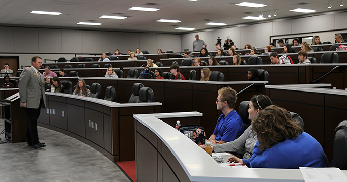 President Weaver tells high school students about the new scholarship