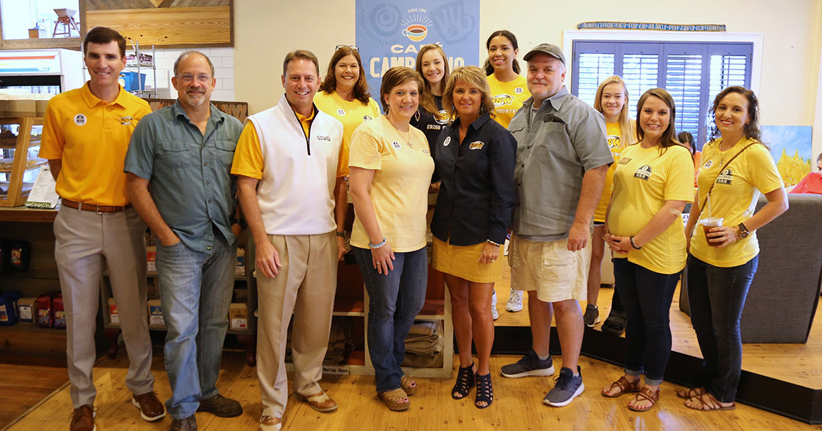 staff wear gold on Day of Giving