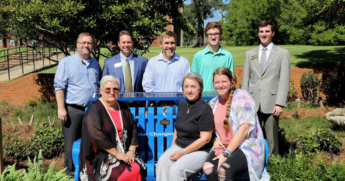 Grimsely family and GSW staff with bench