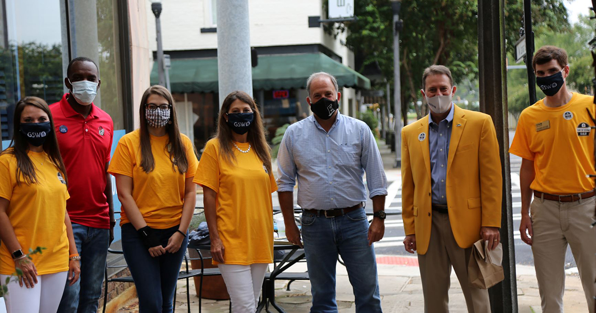 Day of Giving supporters wear gold