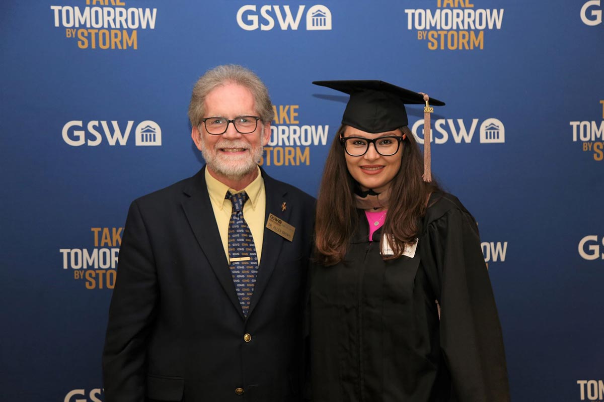 Katharina Novizky-Hosp travelled from Austria to receive her diploma, stepping foot on campus for the first time. She is pictured with her online MBA professor Dr. Allen Brown who she met for the first time in person.