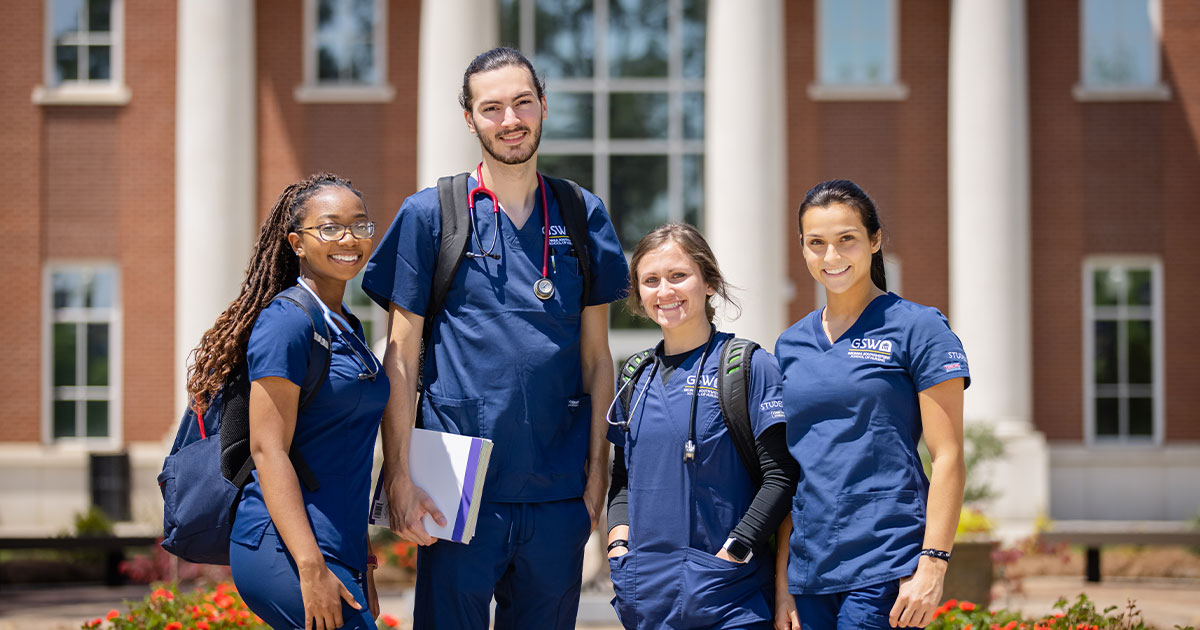 nursing students in front of Carter I building