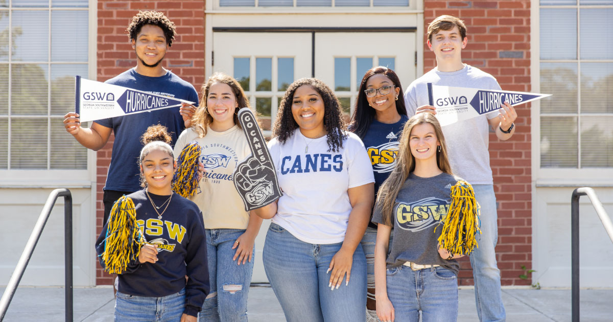 GSW student group holding pom poms and GSW spirit flags