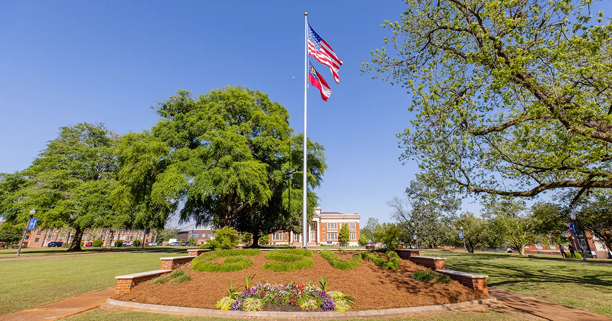 US and Georgia flags fly over GSW's Presidential Plaza