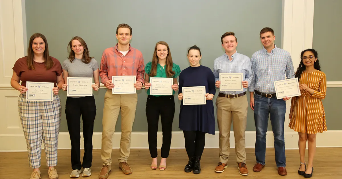 students with their award certificates