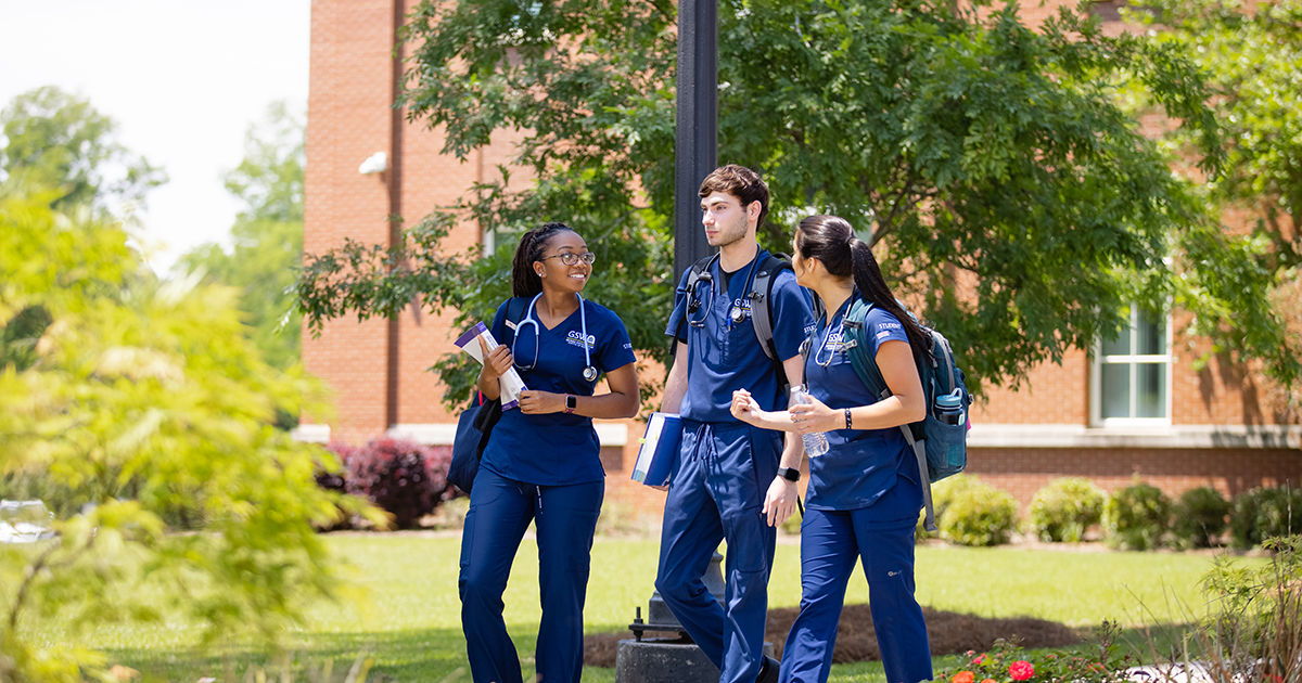 Nursing students walking on campus