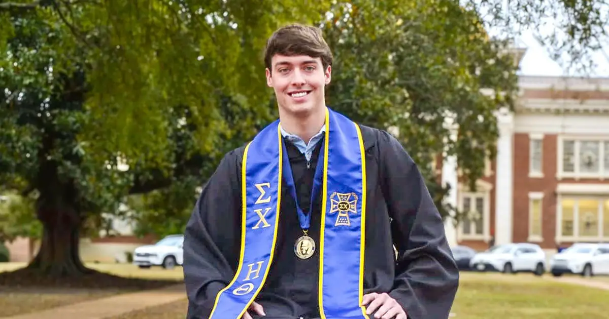 Boone Prince in graduation regalia