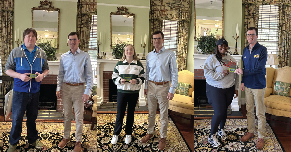 Gas card winners with Director of Foundation