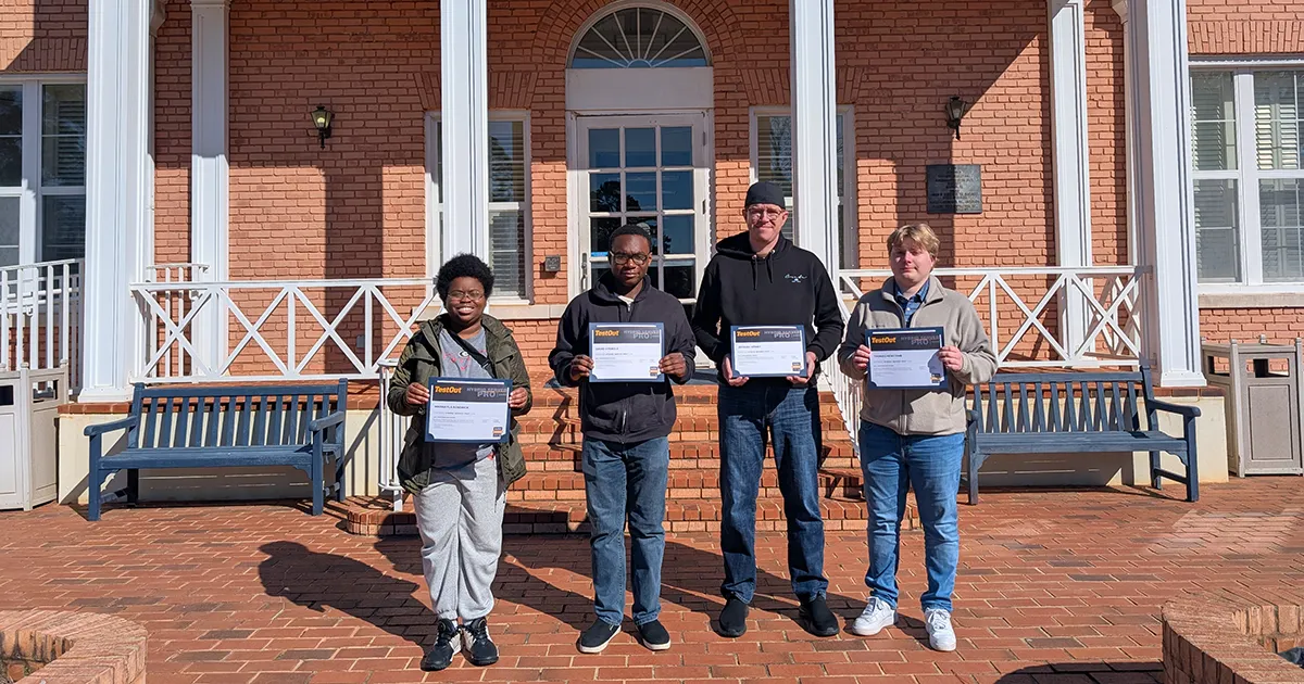 students hold certificates