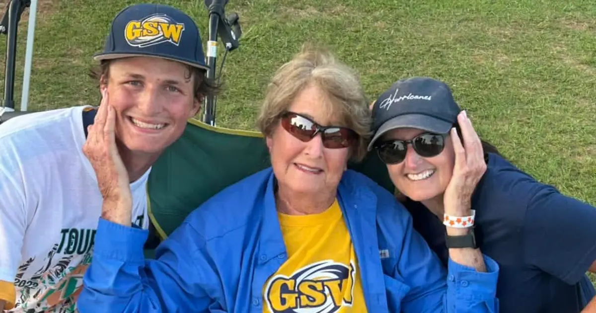 Reid, Vivian, and Michele after GSW won the PBC Tournament in 2023