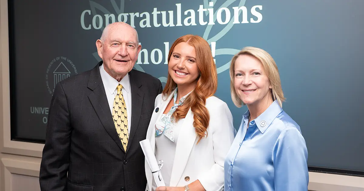 Maddie Taylor with Chancellor Sonny Perdue and GSW President